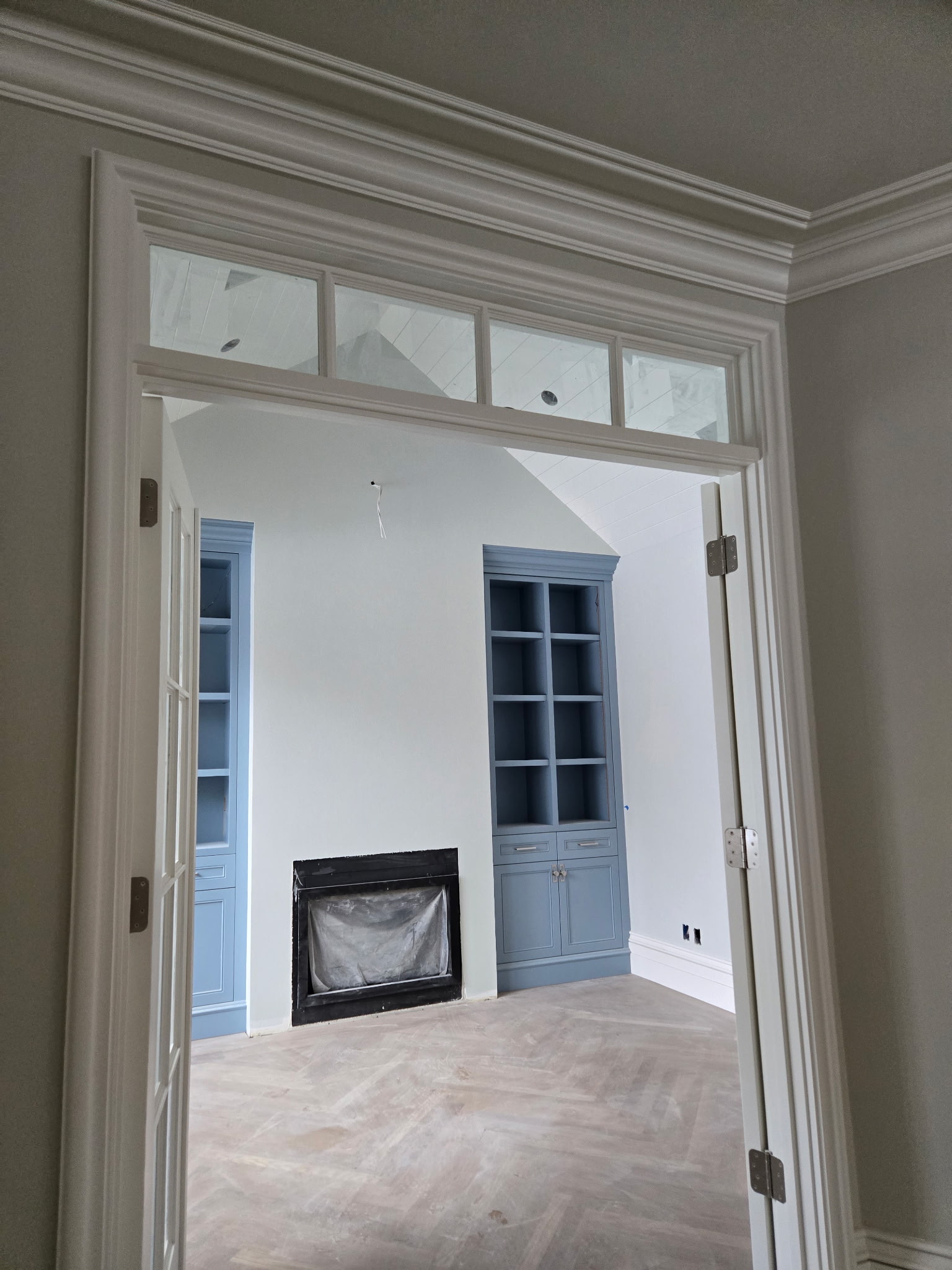 Custom blue built-ins & fireplace surround — Salt Lake County, UT